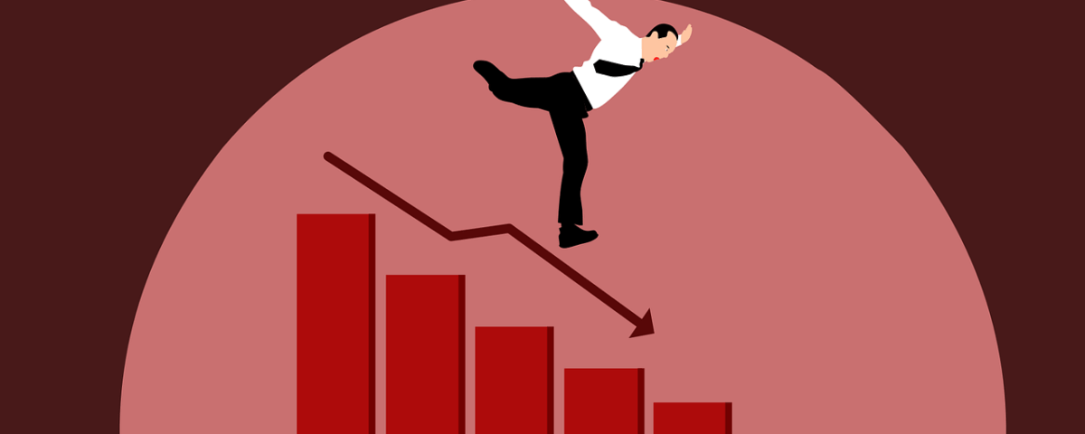 Mann auf einer roten Treppe nach unten - Atienkurs Wirecard